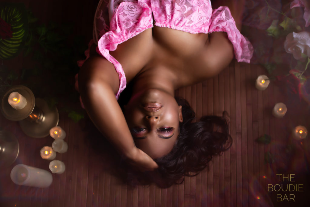 Atlanta boudoir photographer with pink top on