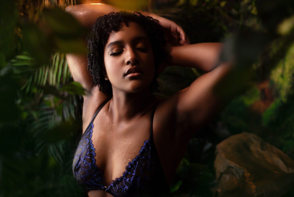 Georgia boudoir photo showing a black woman in a forest.